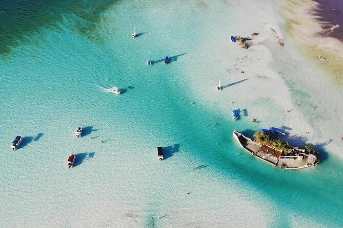 1 Day Tour to Bacalar, Cenotes and 7 color Lagoon with lunch from Cancun - The Highlight: Pontoon Ride on the 7-Colors Lagoon