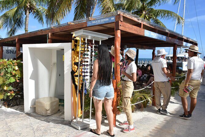 Adults-Only Catamaran Fun from Cancun - Beach Club Chaos and Dancing