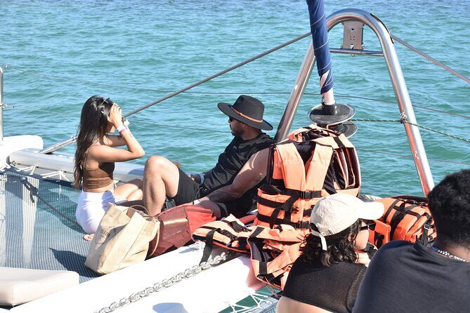 Adults-Only Catamaran Fun from Cancun - Sunset Cheers on the Return Voyage