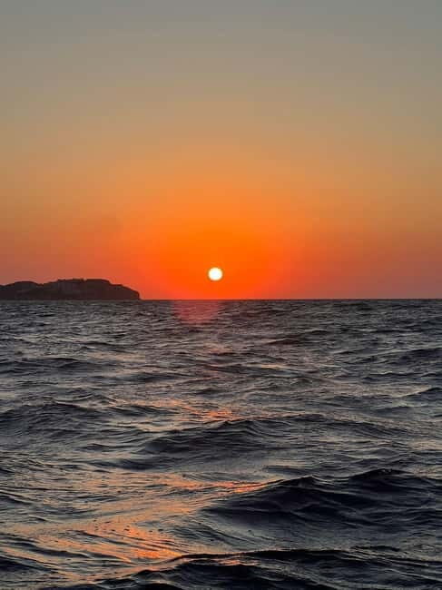 Agia Pelagia: Sunset Motorboat Tour with Soft Drinks - In Summary