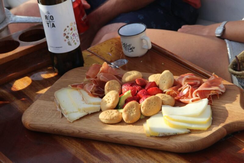 Alcudia: Private Sunset Boat Trip with Glass of Wine & Snack - Who Should Consider This Experience?