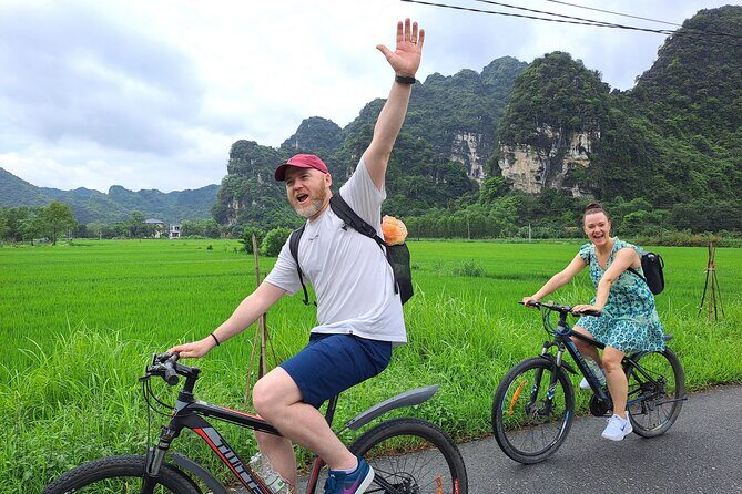 Amazing Ninh Binh Day Tour: Mua Cave - Tam Coc - Hoa Lu - Cycling Through Rice Fields and Local Life