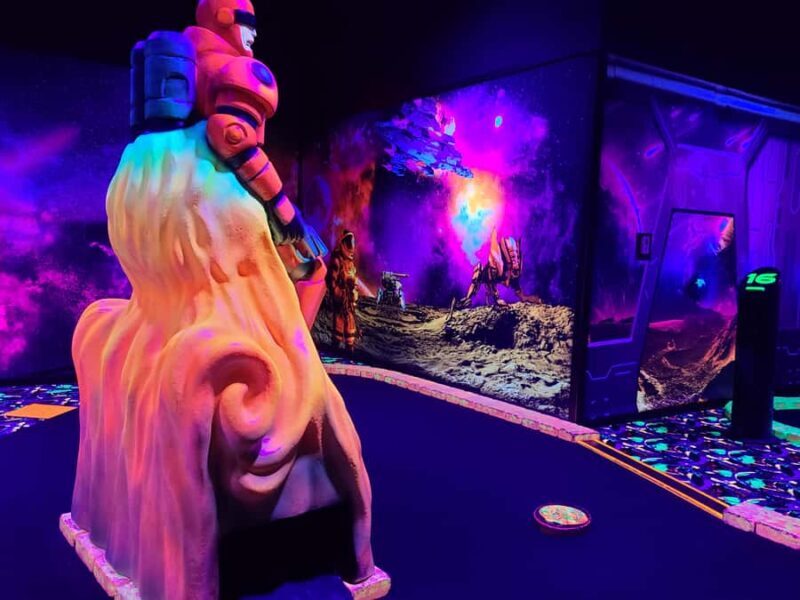 American Dream: Blacklight Mini Golf Entry Ticket - Key Points