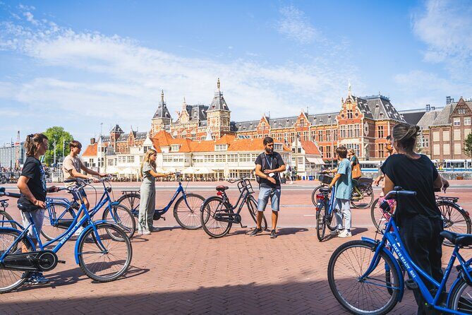 Amsterdam Bike Tour With Optional Canal Cruise (small-goups) - Passing by De Gooyer Windmill