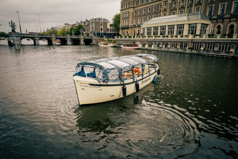 Amsterdam: Canal Booze Cruise with Unlimited Drinks Option - Key Points