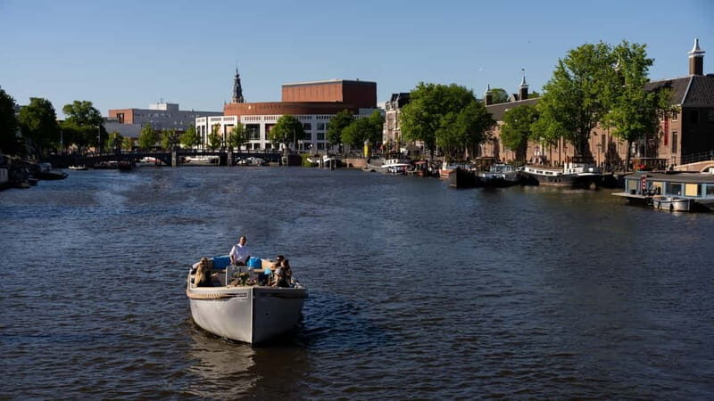 Amsterdam: Canal Cruise in Open Boat with Drink Option - Drinks and Comfort