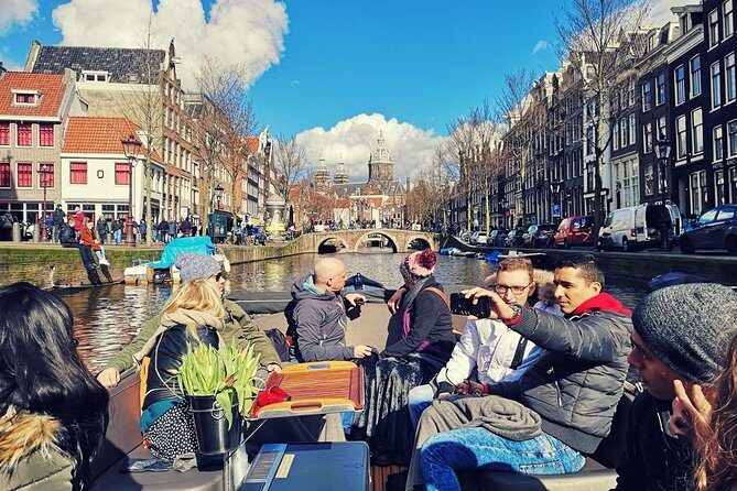 Amsterdam Canal Cruise on a small open boat (max 12 guests) - The Sum Up