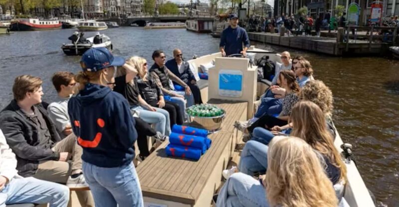 Amsterdam: City Highlights Small Boat Canal Cruise with host - Key Points