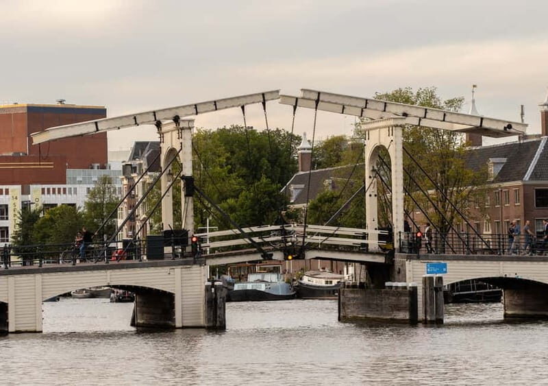 Amsterdam: German Canal Cruise with Unlimited Drinks Option - Practical Details and Booking