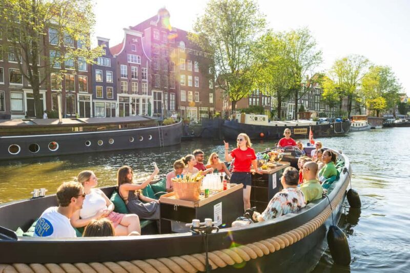 Amsterdam: Guided Open Boat Cruise Unlimited Drinks Option - The Sum Up