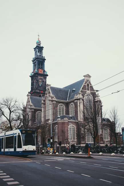 Amsterdam: Hidden Gems and Highlights in DE/EN/IT - The Sum Up
