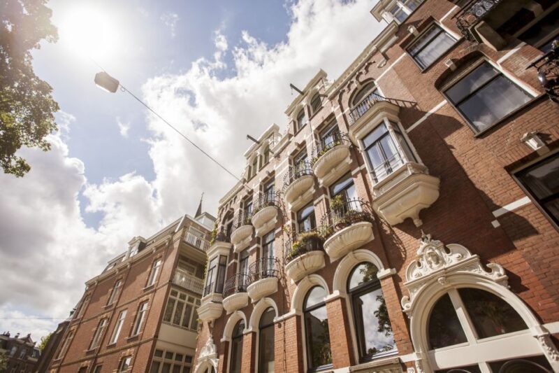 Amsterdam: Hidden Gems & Highlights Guided Bike Tour - The Sum Up