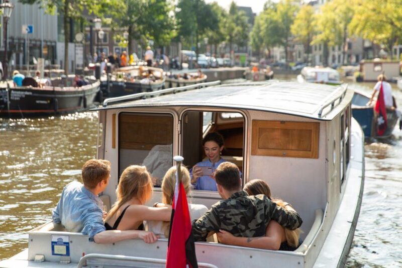 Amsterdam: Historic Boat Cruise with open bar and nibbles - What Makes This Boat Cruise Stand Out