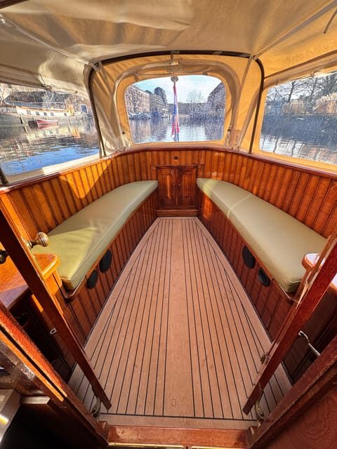 Amsterdam: Historic Boat Cruise with open bar and nibbles - Why Travelers Love It