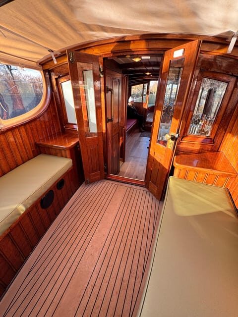 Amsterdam: Historic Boat Cruise with open bar and nibbles - The Sum Up