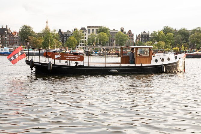 Amsterdam Small-Group Canal Cruise With Dutch Snacks and Drink - Setting the Scene: Why This Canal Cruise Stands Out