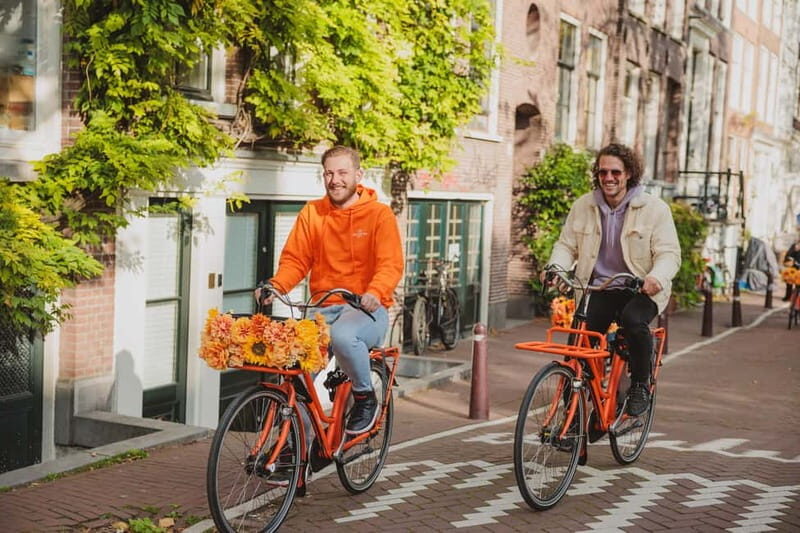 Amsterdam: Top Highlights Guided Bike Tour EN/DE/ES/FR/IT/CN - Key Points