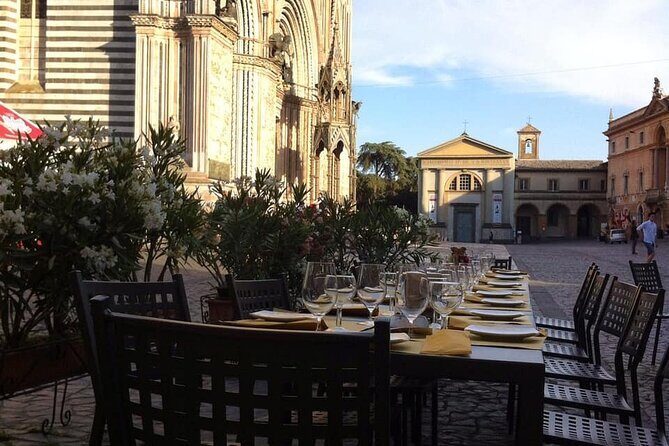 Aperitif in front of the Duomo and Orvieto Underground Caves tour - The Food and Wine Experience