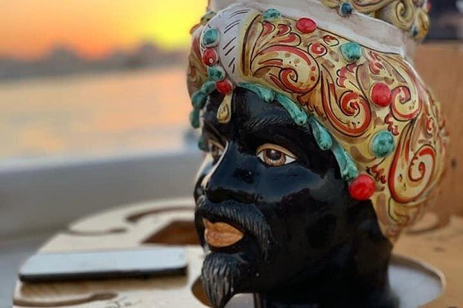 Aperitif on the boat at Sunset island and sea caves - An In-depth Look at the Experience