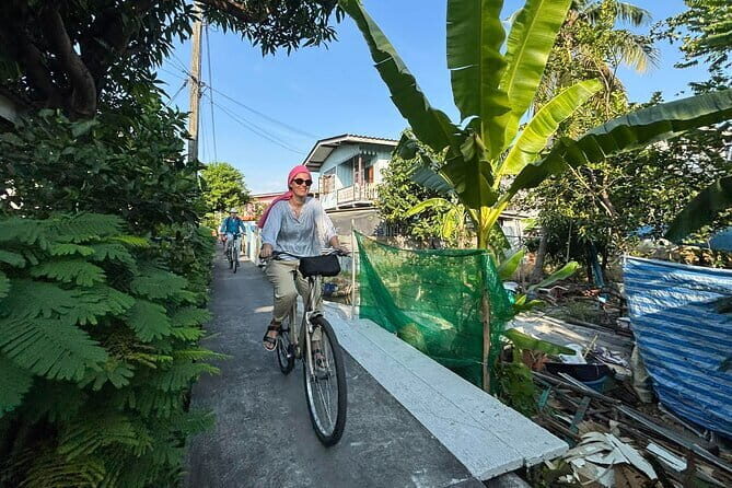Bangkok Thonburi Backstreets and 3 Peaceful Temple Bike Tour - Key Points