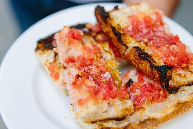Barcelona Night Bike Tour with Local Tapas and Cava Stop - Authentic Experiences and What You Get
