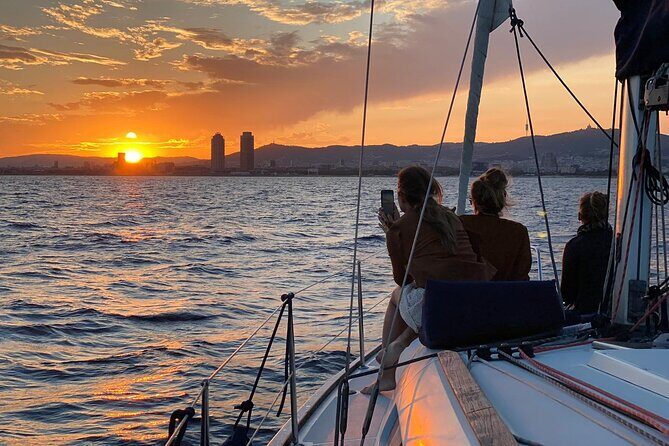 Barcelona Sunset Cruise with Open Bar of Cava and Snacks - Key Points