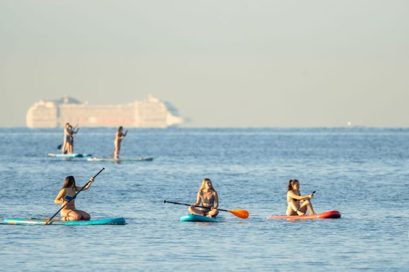Barcelona: Sunset Paddleboarding Experience with 1 Beer - Key Points