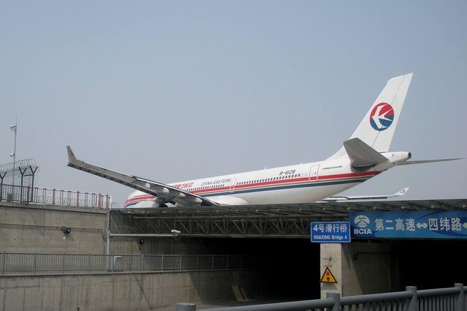 Beijing Capital International Airport Transfer: Airport (PEK) to Hotel Roundtrip - The Sum Up