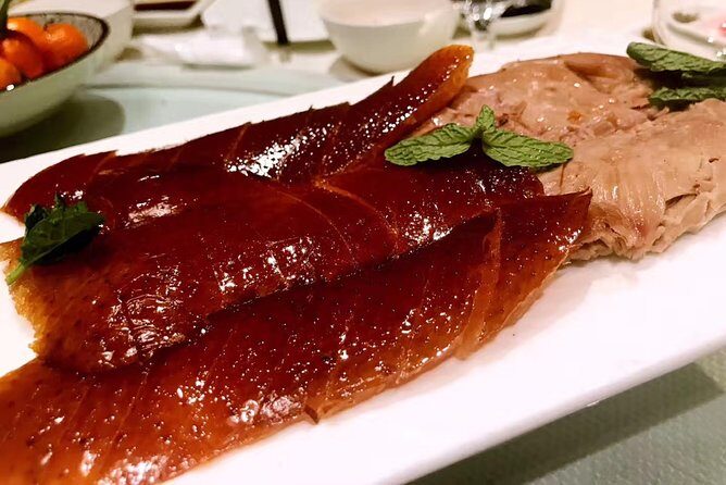 Beijing Evening Tour: Chaoyang Acrobatic Show with Peking Duck Dinner - The Itinerary Explored