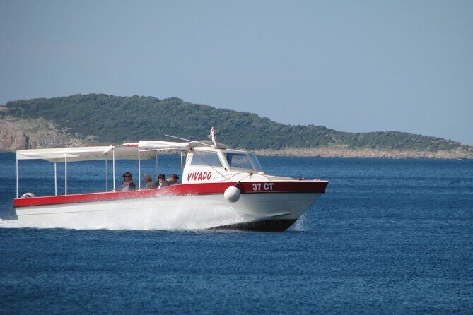 Blue and green cave on Koloep - Authentic Experiences Shared by Travelers