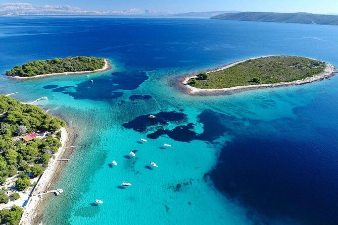 Blue Lagoon, Trogir & iovo catamaran tour with Food and Drinks - The Experience Breakdown: What to Expect on This Croatian Catamaran Adventure