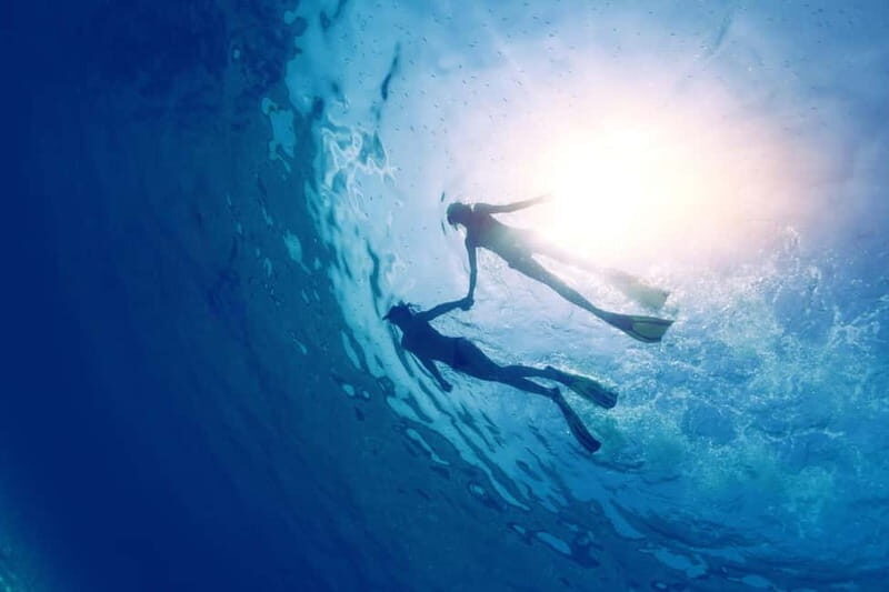 Boat trip along the south coast of Menorca: snorkeling and stand up paddle. - The Sum Up