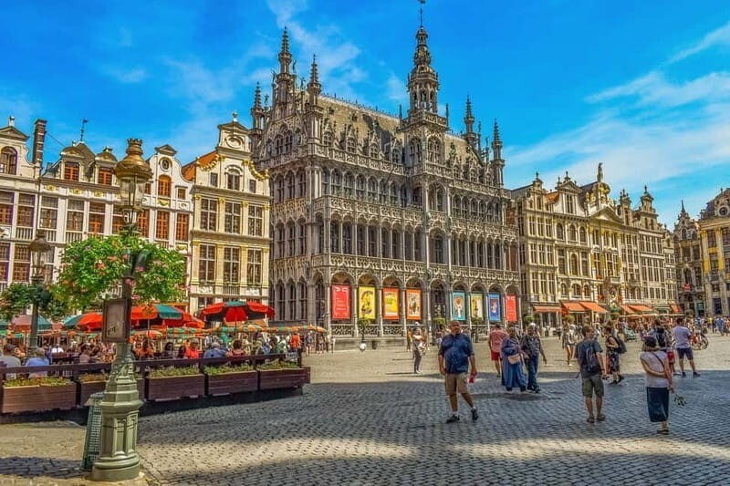 Brussels Highlights: Walking & Bus Tour with Waffle Tasting - Key Points