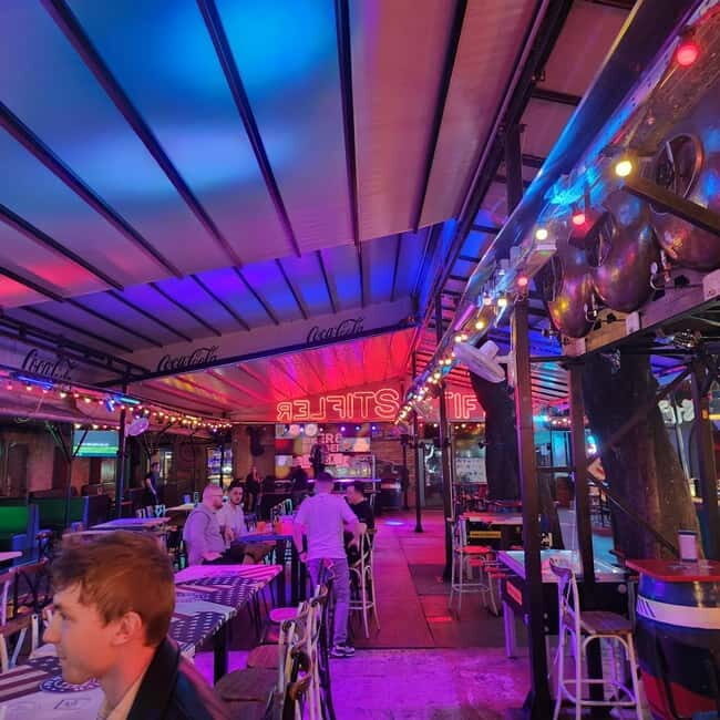 Budapest: Jewish District Night Walking Tour with Drinks - Key Points