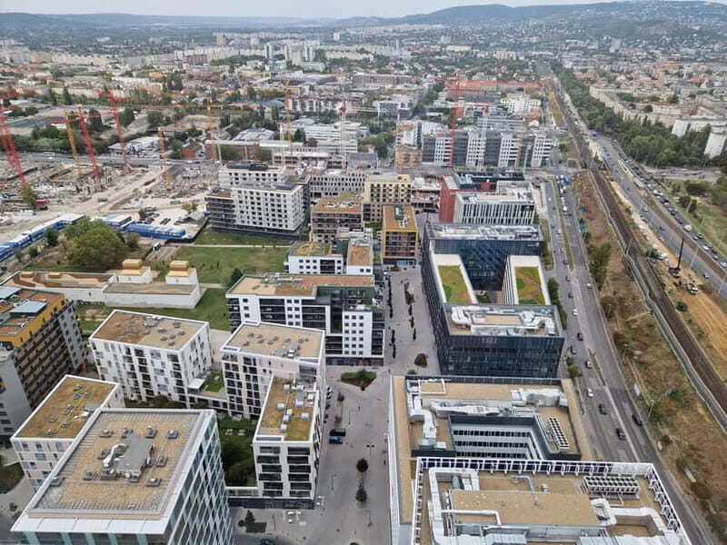 Budapest: Past & Future Tour with Unicum Tasting & MOL Visit - Passing Landmarks and Local Atmosphere