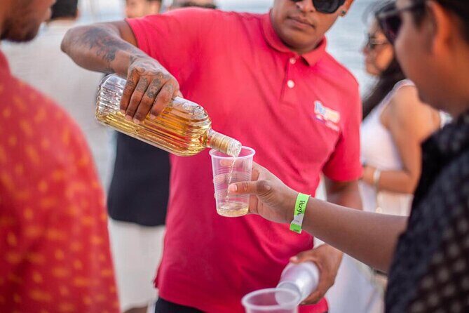 Cabo Party Cruise with Sunset, Music & Open Bar - The Sum Up