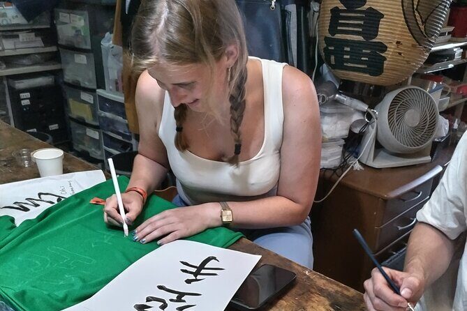 Calligraphy on T-shirt and lantern near Skytree Tokyo - Key Points