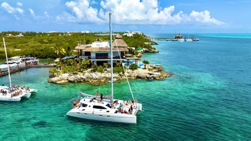 Cancún Catamaran to Isla Mujeres + Snorkel, Open Bar & Lunch - The Sum Up