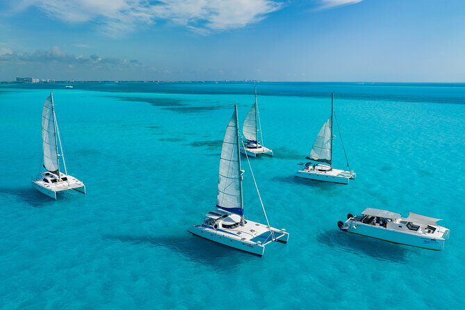 Cancún Catamaran to Isla Mujeres + Snorkel, Open Bar & Lunch - Starting Point & Booking