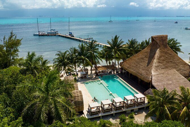 Cancún Catamaran to Isla Mujeres + Snorkel, Open Bar & Lunch - Snorkeling at El Meco Reef