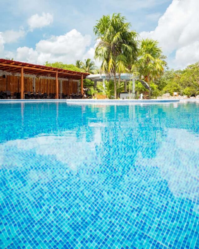 Cancun: Cenotes El Retoño entrance with transport, food, and guided tour. - Exploring the Park: Bikes, Pools, and Loungers