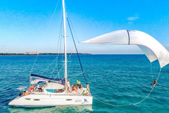 Catamaran family friendly Tour to Isla Mujeres with lunch - Key Points