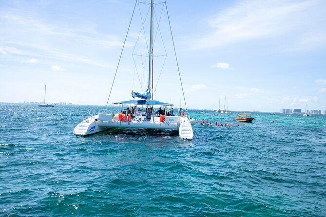 Catamaran Party on the Caribbean Sea to Isla Mujeres - The Open Bar and Buffet