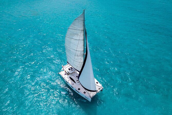 Catamaran Snorkeling and Lunch Tour to Isla Mujeres Included - Key Points