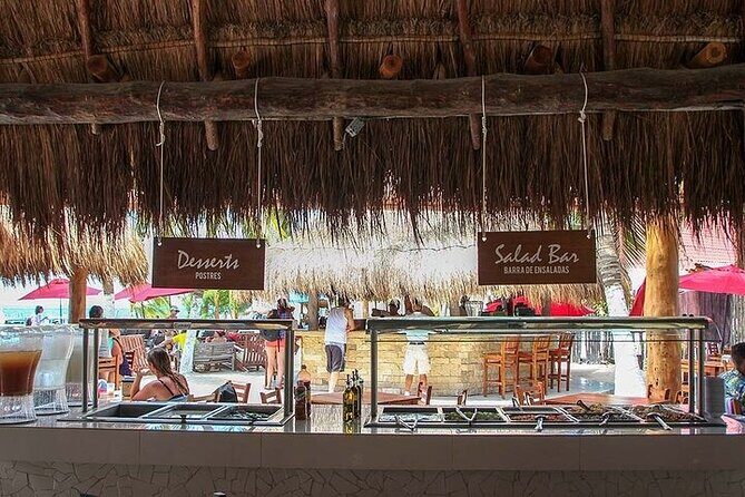 Catamaran to Isla Mujeres Only for Adults - Buffet & DJ at the Beach Club - The Bottom Line