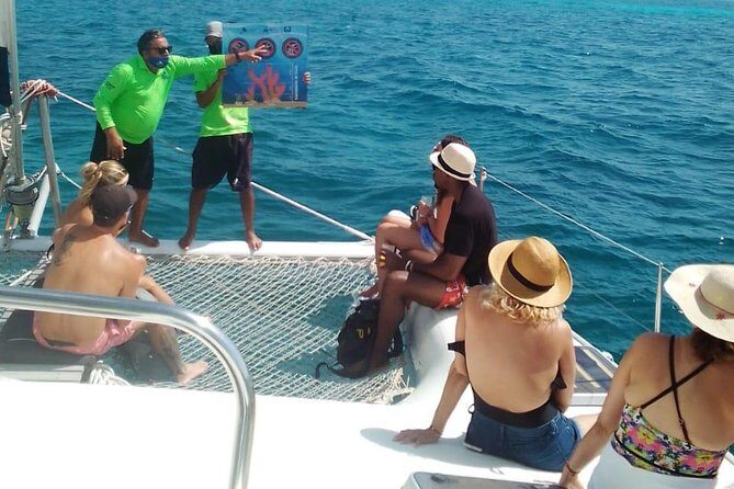 Catamaran to Isla Mujeres, Open bar, buffet, Beach Club Included - Who Should Consider This Tour?