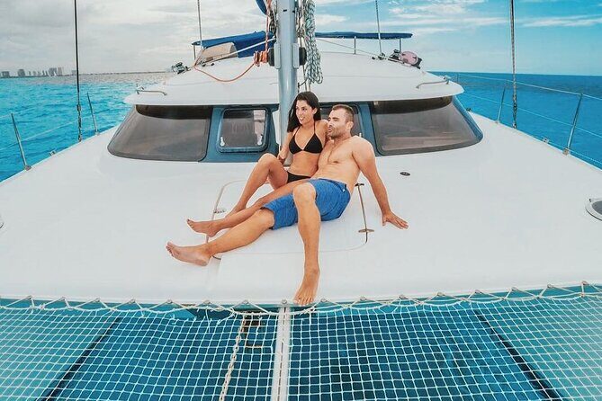 Catamaran to Isla Mujeres with Buffet and Open Bar from Cancun - The Sum Up