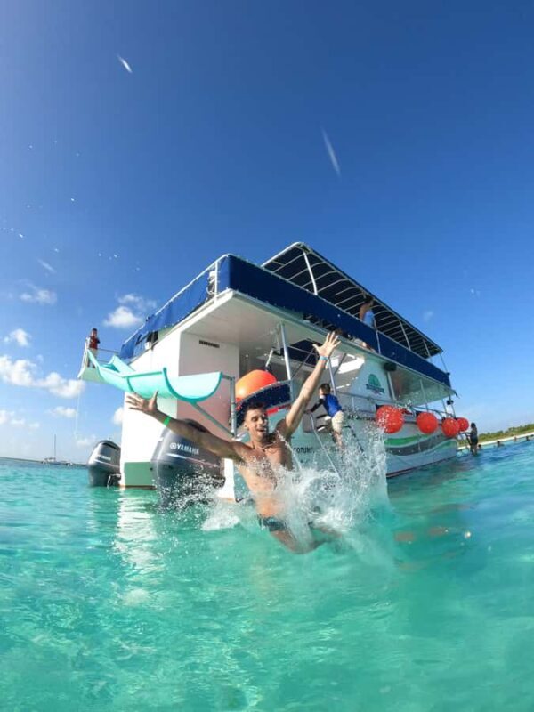 Catamaran with a slide in Cozumel El Cielo, Cielito, and Palancar Reef - The Experience: What to Expect on the Water