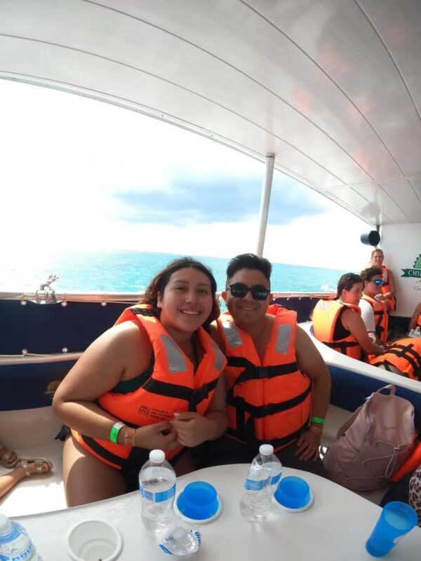 Catamaran with a slide in Cozumel El Cielo, Cielito, and Palancar Reef - The Sum Up