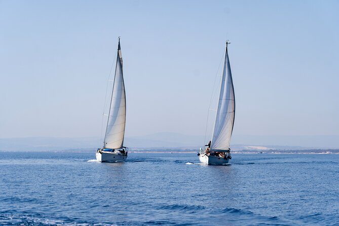 Catania boat tour along the coast with aperitif and snorkeling - Authenticity and Local Insights